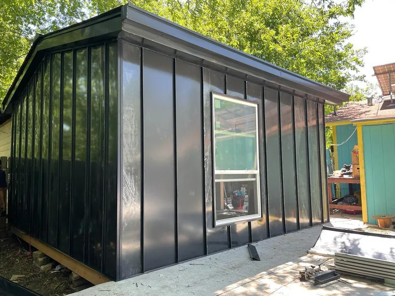 Black standing seam metal wall panels for Roof Inspection in Grayson