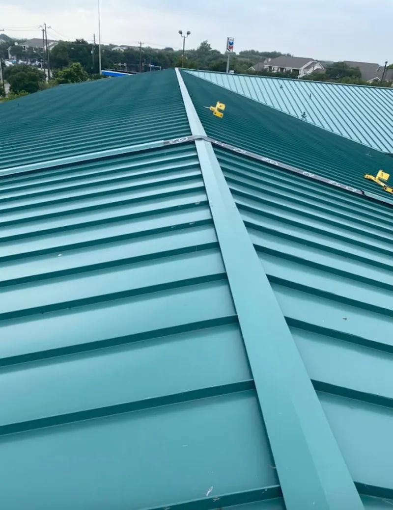 Green commercial metal roof ridge and valley for Metal Roof Repair in Grayson
