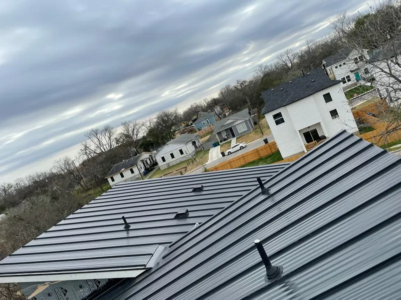 Standing seam metal roof panels with vents for Skylight Repair in Grayson